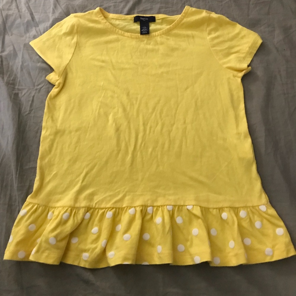 A yellow tee shirt for children.